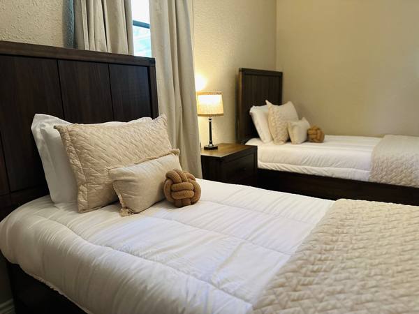 Bedroom 2: two single beds and smart TV