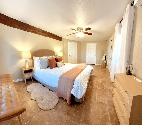 Bedroom 3: queen bed with a private patio